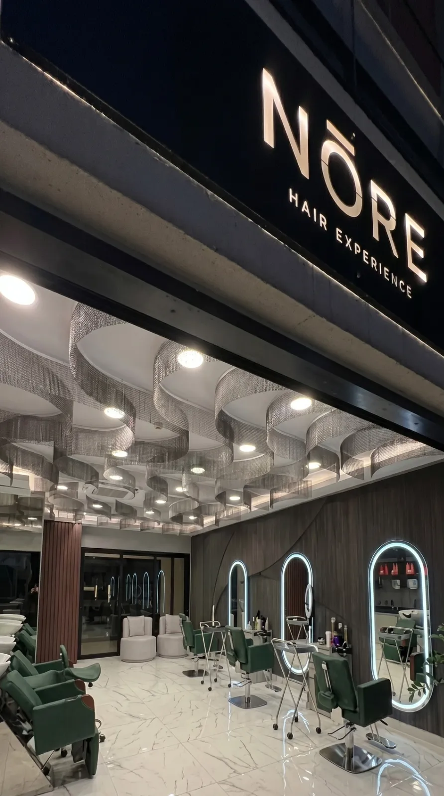 NŌRE salon interior with charcoal stone and marble